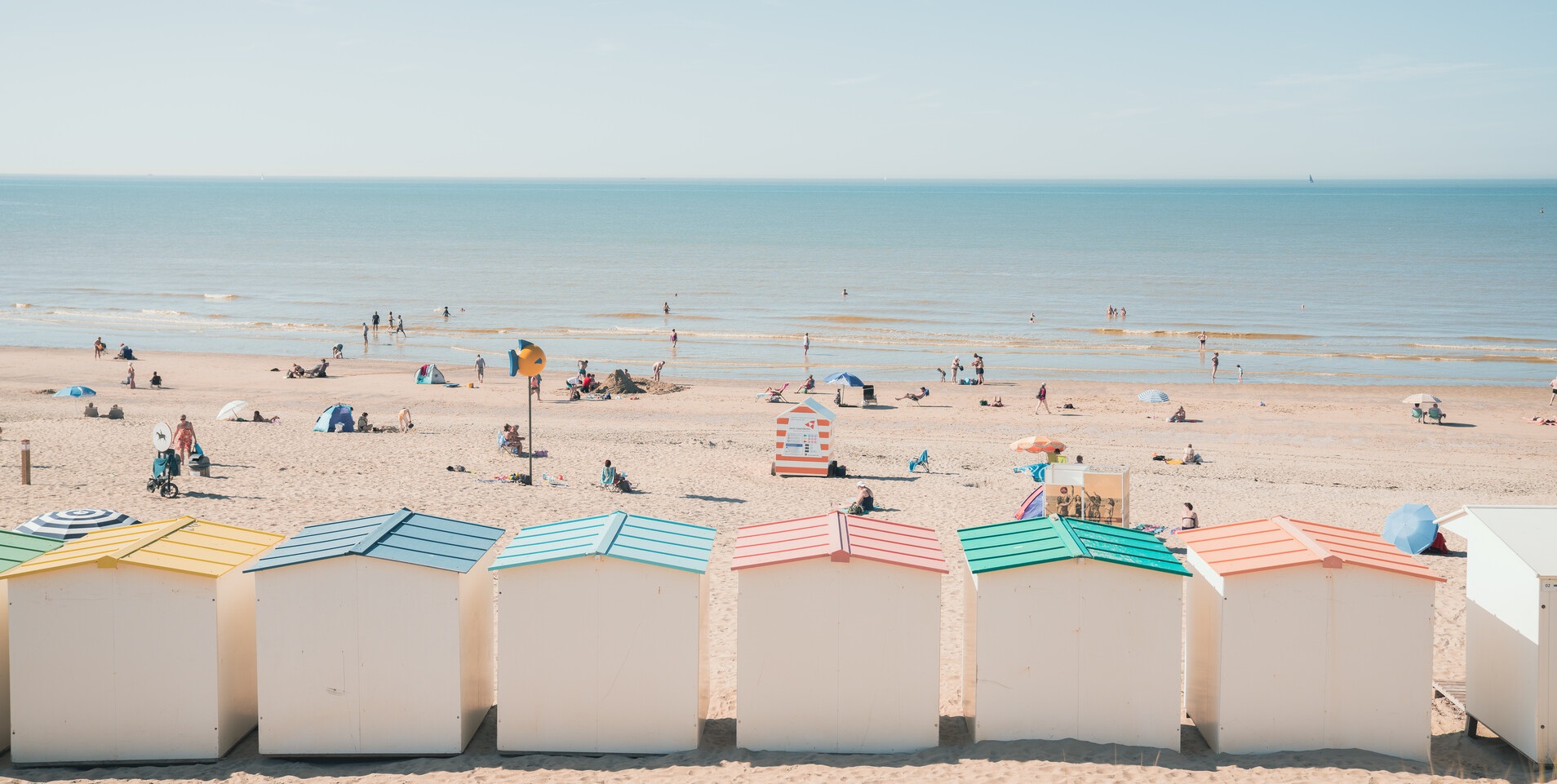 strand de haan met cabines